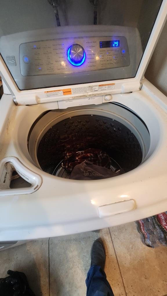 Washing machine repair or Installation service . Fixing a Broken Washing Machine: Exploring our Repair Process