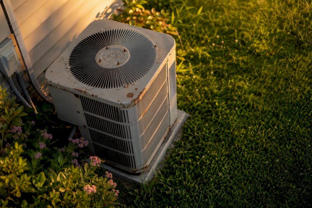 Older, weathered outdoor air conditioner unit